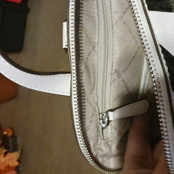 Michael kors purse backpack, white leather, with black MK on it. - Picture 4 of 4